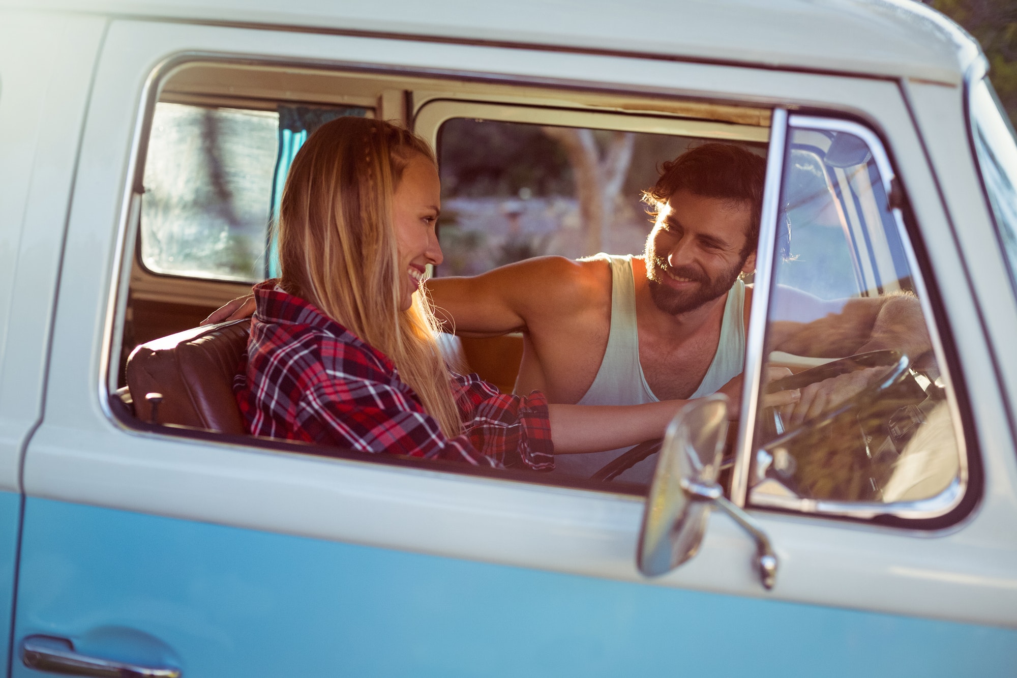 Couple travelling in campervan